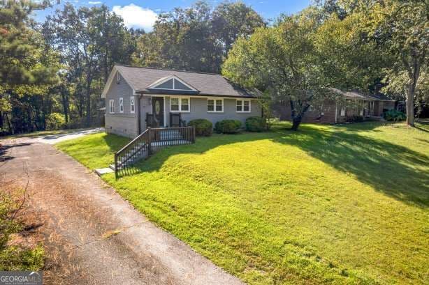 3 bedroom, 2 bathroom, 1,700 sq ft single family residence for sale at 2105 S Stone Mountain Lithonia Road, Lithonia, GA 30058 — photo 2