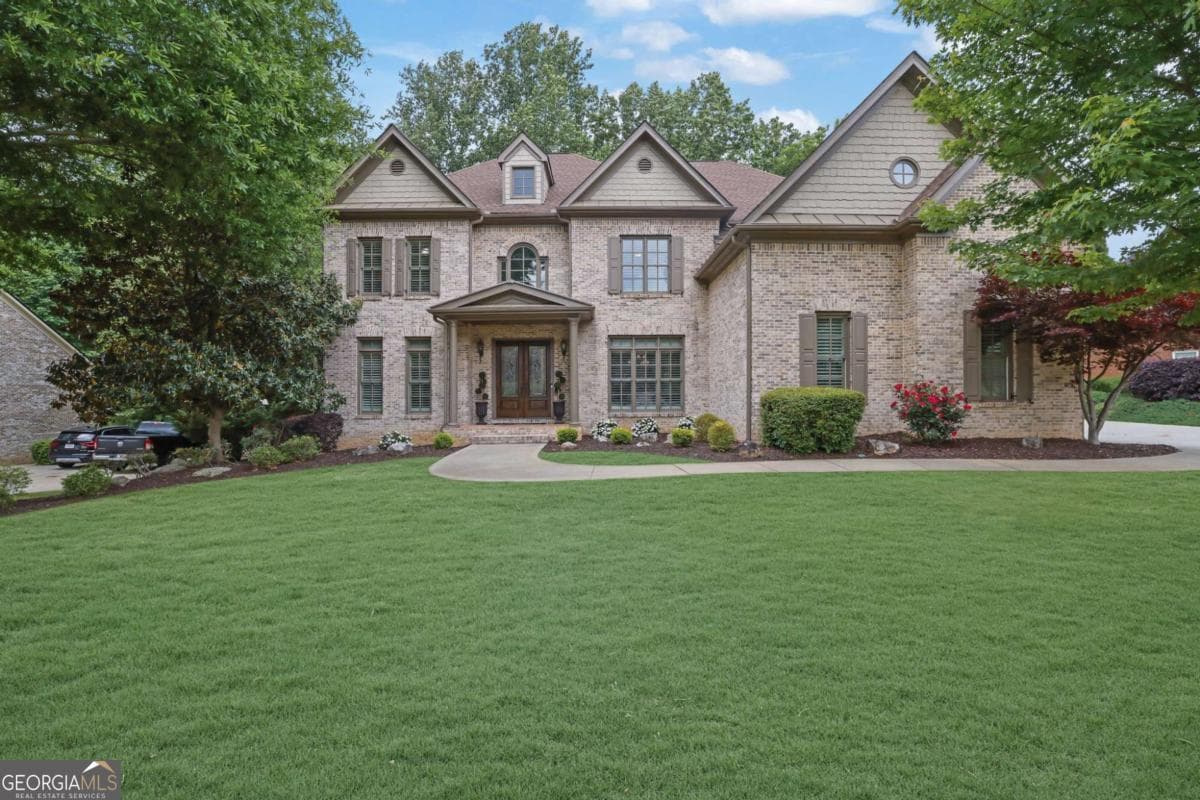 7 bedroom, 5.5 bathroom, 6,928 sq ft single family residence sold at 4040 Preserve Crossing Lane, Cumming, GA 30040