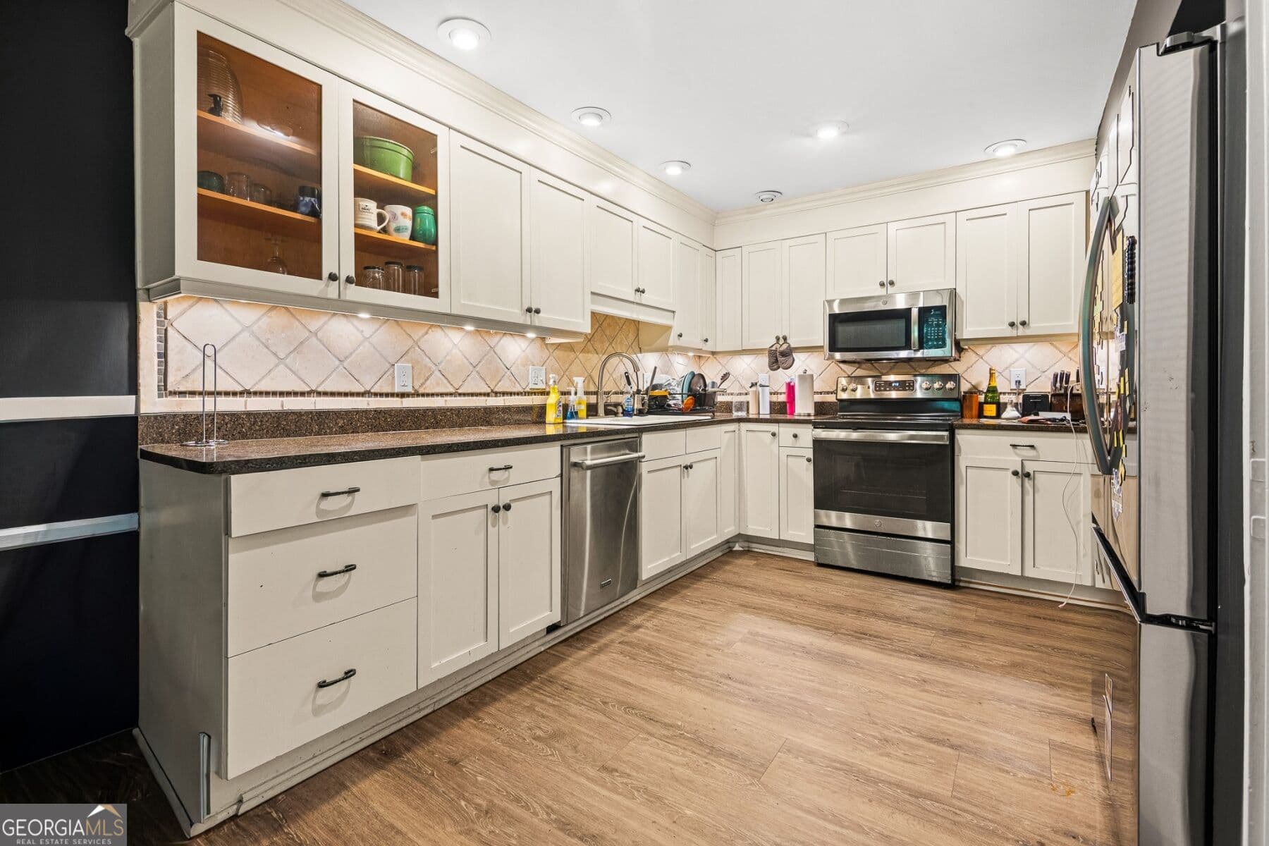 4 bedroom, 3 bathroom, 2,499 sq ft condominium for sale at 153 Maribeau Square, Atlanta, GA 30327 — photo 7