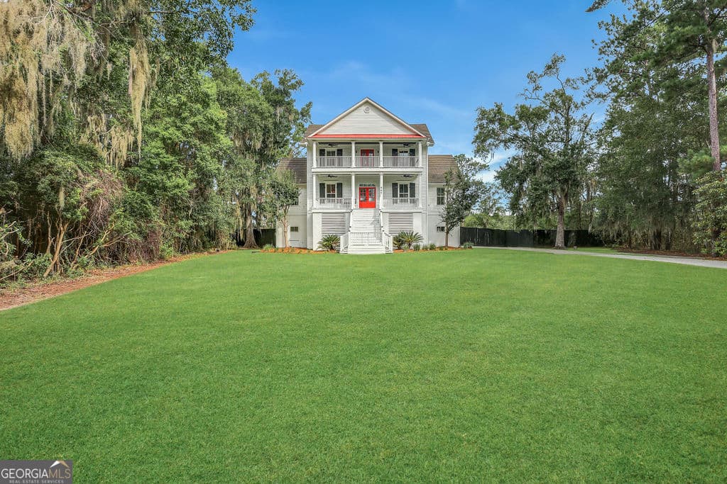 6 bedroom, 5 bathroom single family residence for sale at 447 Sterling Woods Drive, Richmond Hill, GA 31324 — photo 2