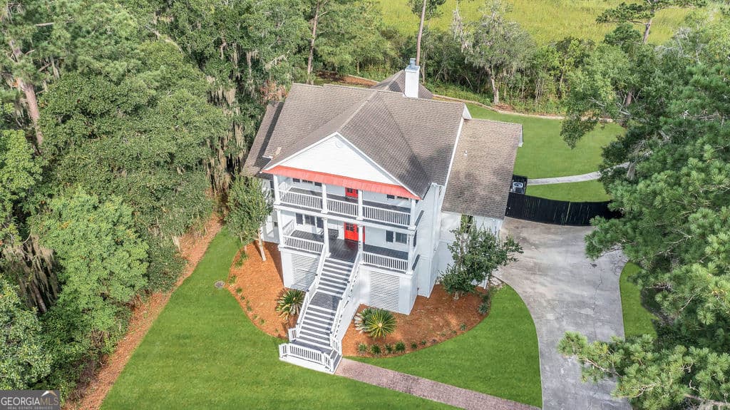 6 bedroom, 5 bathroom single family residence for sale at 447 Sterling Woods Drive, Richmond Hill, GA 31324 — photo 6