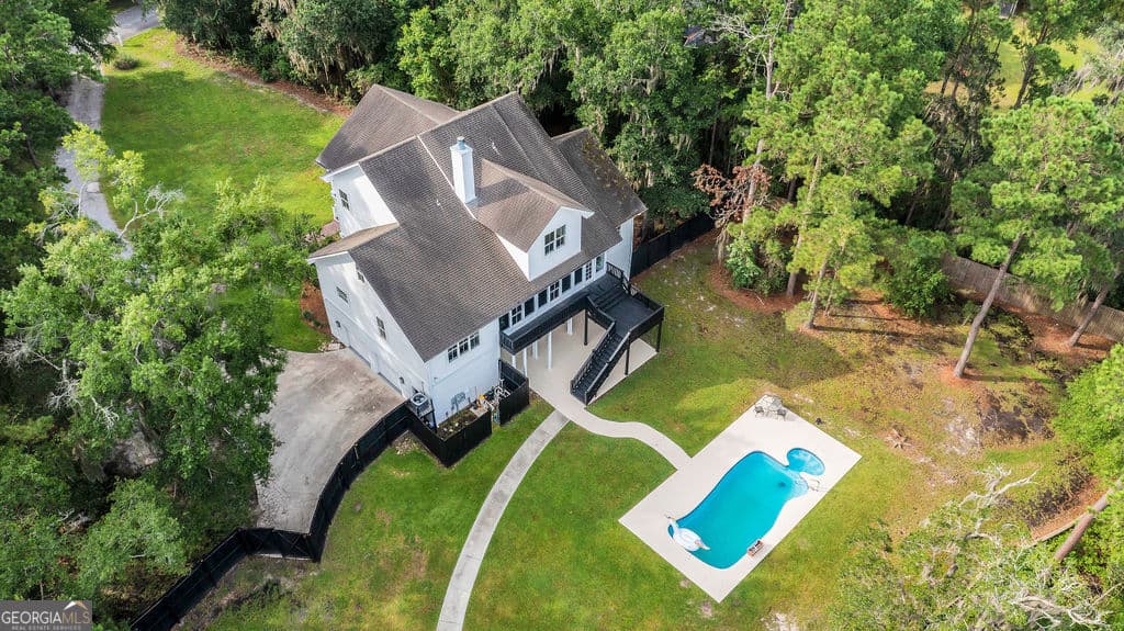6 bedroom, 5 bathroom single family residence for sale at 447 Sterling Woods Drive, Richmond Hill, GA 31324 — photo 7