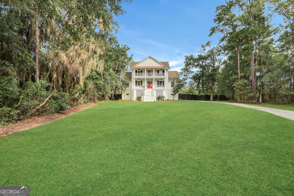 6 bedroom, 5 bathroom single family residence for sale at 447 Sterling Woods Drive, Richmond Hill, GA 31324 — photo 4