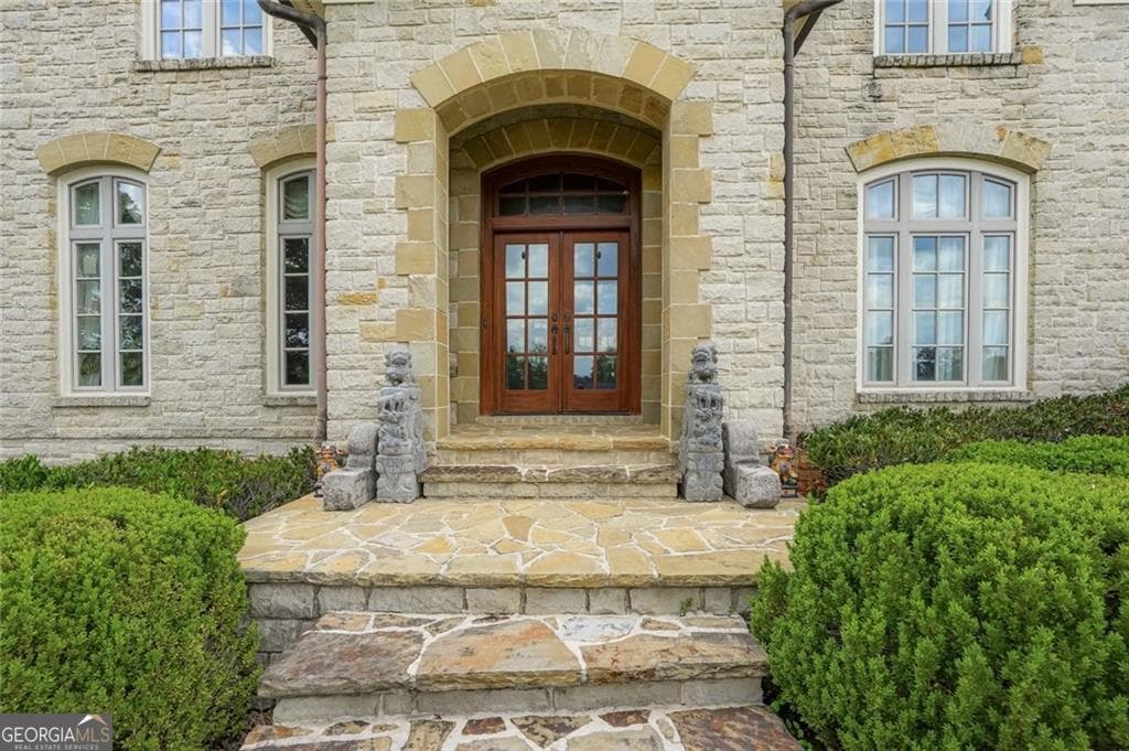 6 bedroom, 7.5 bathroom, 14,750 sq ft single family residence for sale at 4998 Gunnison Trace, Suwanee, GA 30024 — photo 2