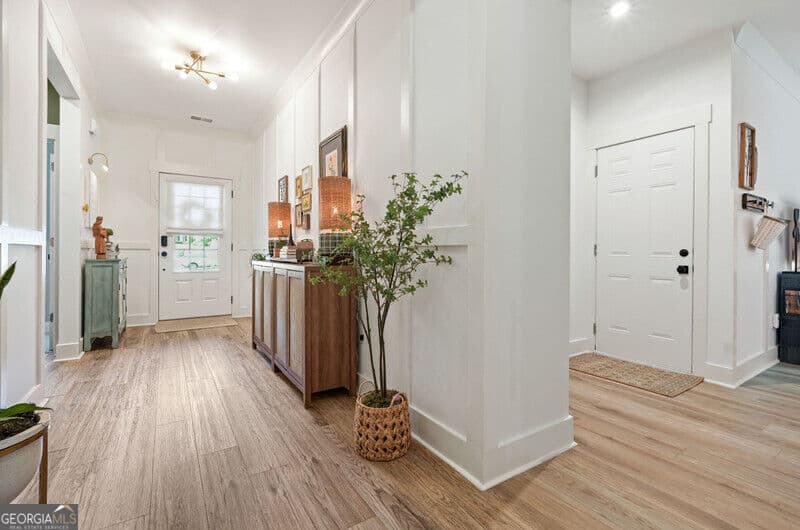 3 bedroom, 2.5 bathroom, 2,335 sq ft single family residence for sale at 409 Mcdaniel Place, Canton, GA 30115 — photo 3