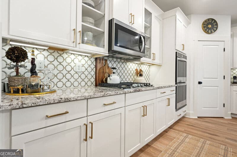 3 bedroom, 2.5 bathroom, 2,335 sq ft single family residence for sale at 409 Mcdaniel Place, Canton, GA 30115 — photo 9