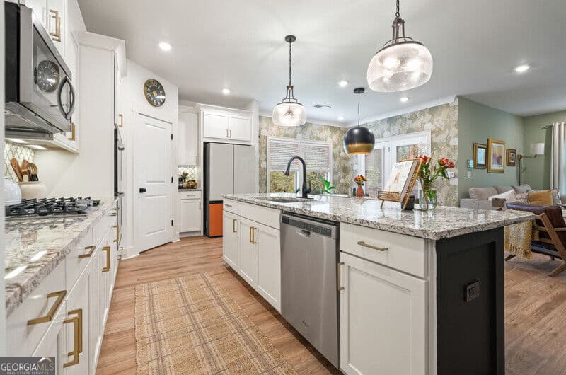 3 bedroom, 2.5 bathroom, 2,335 sq ft single family residence for sale at 409 Mcdaniel Place, Canton, GA 30115 — photo 10