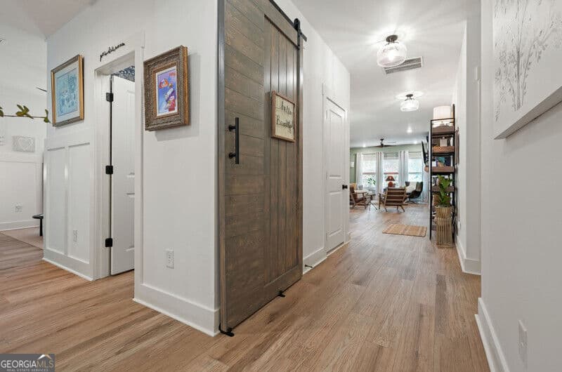 3 bedroom, 2.5 bathroom, 2,335 sq ft single family residence for sale at 409 Mcdaniel Place, Canton, GA 30115 — photo 4