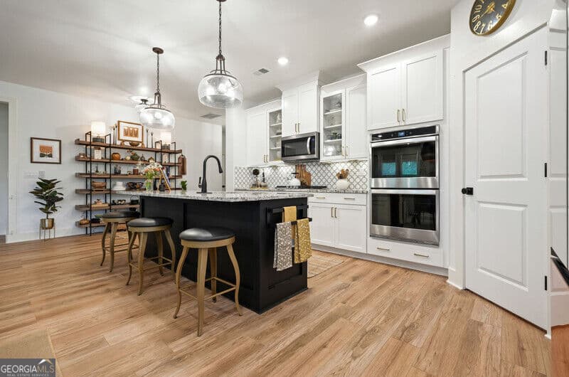 3 bedroom, 2.5 bathroom, 2,335 sq ft single family residence for sale at 409 Mcdaniel Place, Canton, GA 30115 — photo 8