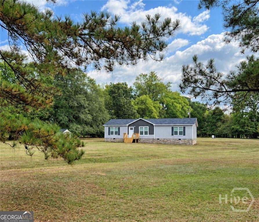 3 bedroom, 2 bathroom, 1,568 sq ft manufactured home,single family residence for sale at 2183 River Road, Elberton, GA 30635 — photo 2