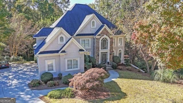 5 bedroom, 4.5 bathroom, 6,379 sq ft single family residence for rent at 2502 Oak Hill Overlook, Duluth, GA 30097 for $5,500 a month — photo 3