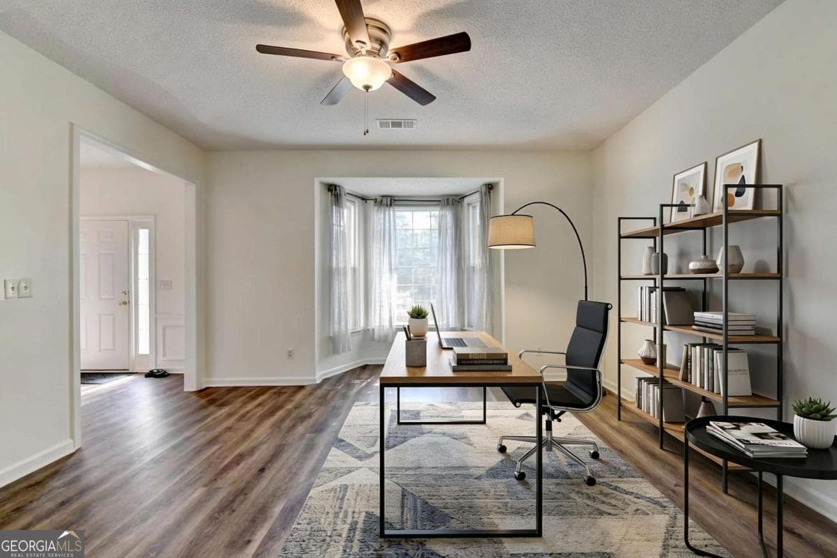 4 bedroom, 2.5 bathroom, 2,283 sq ft single family residence for sale at 900 Cherringham Court, Johns Creek, GA 30005 — photo 4