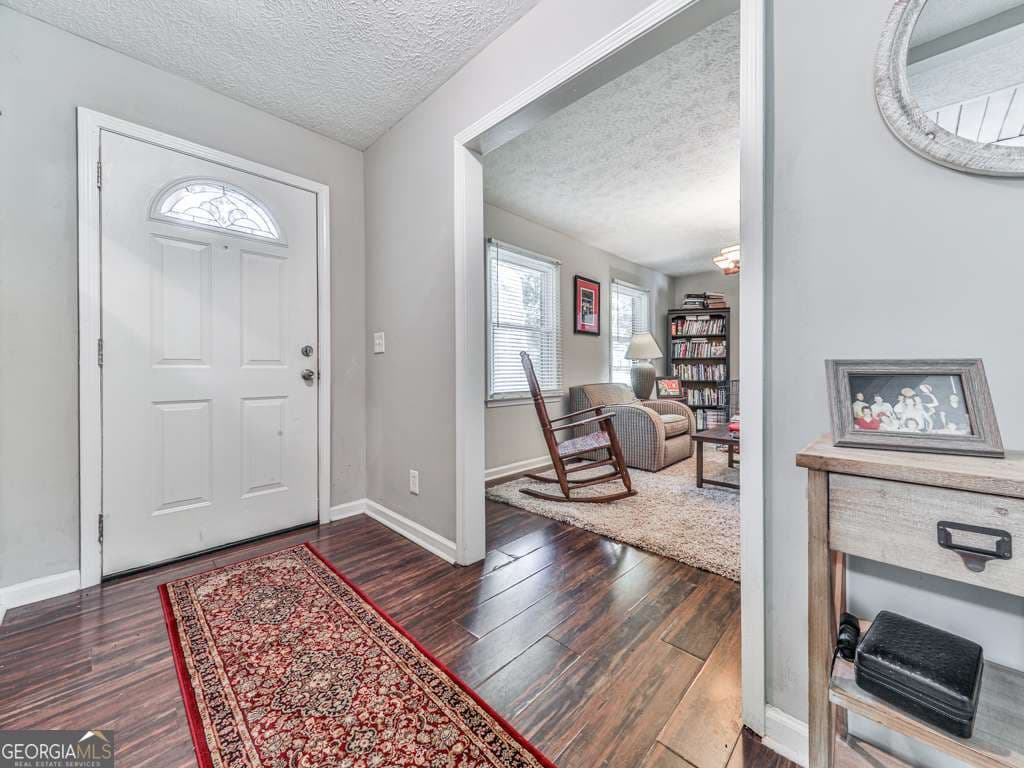 4 bedroom, 3 bathroom, 1,476 sq ft single family residence for sale at 132 Little Brook Drive, Woodstock, GA 30188 — photo 3