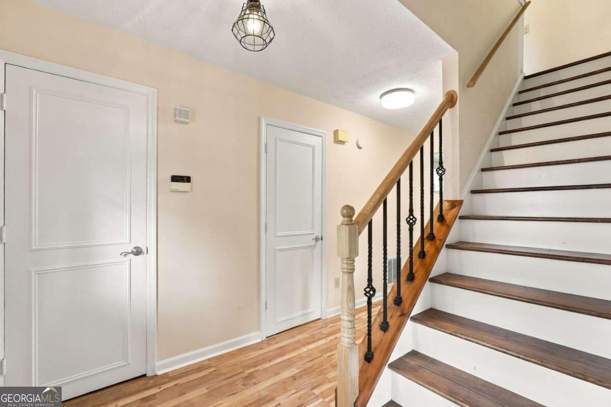 3 bedroom, 2.5 bathroom, 2,185 sq ft single family residence for sale at 5004 Brandlwood Court, Lilburn, GA 30047 — photo 2