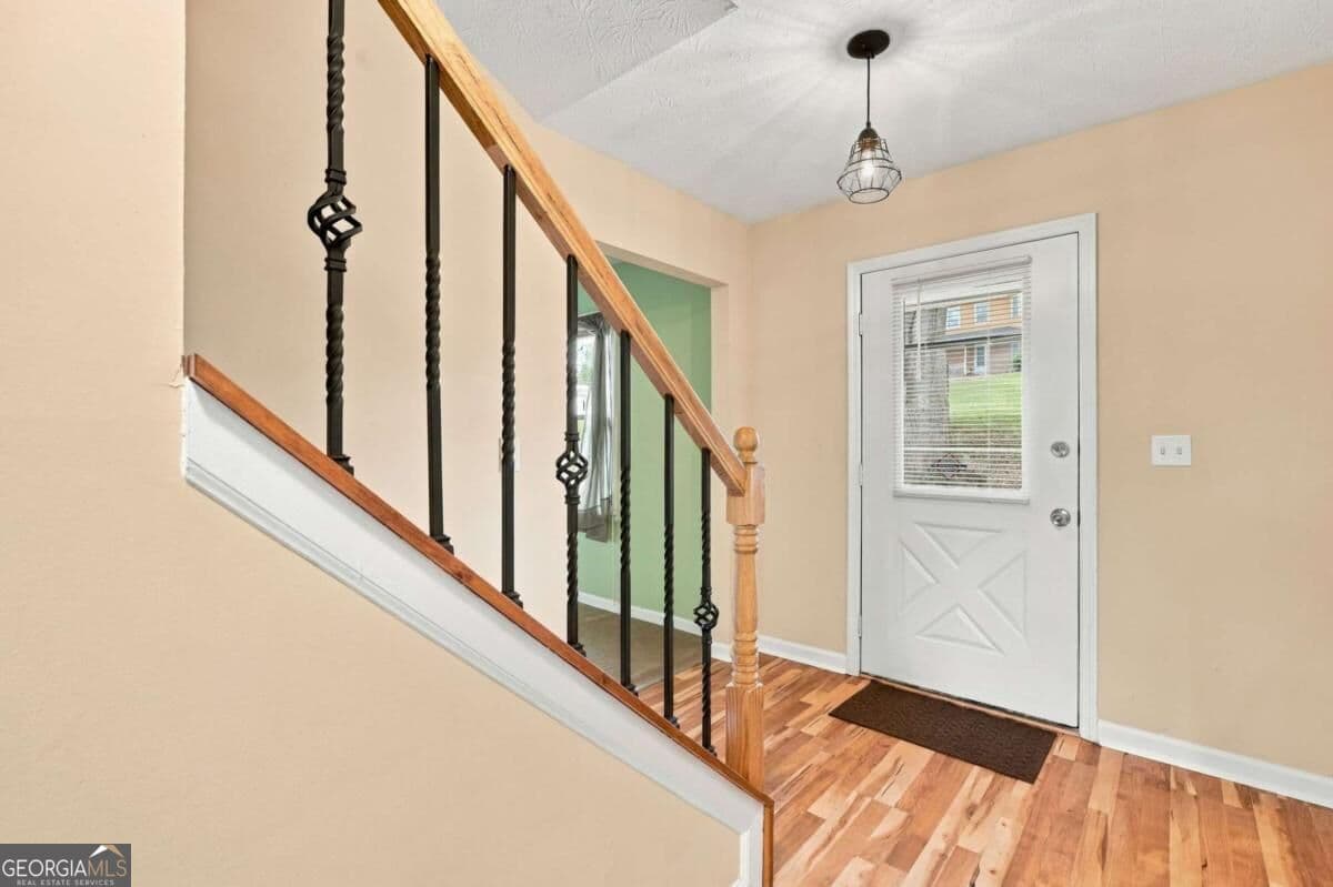 3 bedroom, 2.5 bathroom, 2,185 sq ft single family residence for sale at 5004 Brandlwood Court, Lilburn, GA 30047 — photo 3