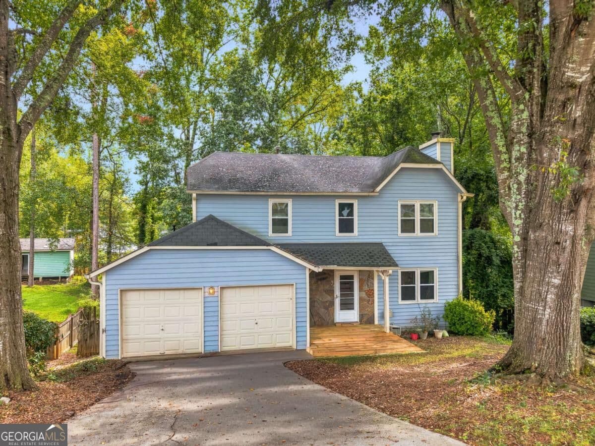 3 bedroom, 2.5 bathroom, 2,185 sq ft single family residence for sale at 5004 Brandlwood Court, Lilburn, GA 30047 — photo 1 of 39