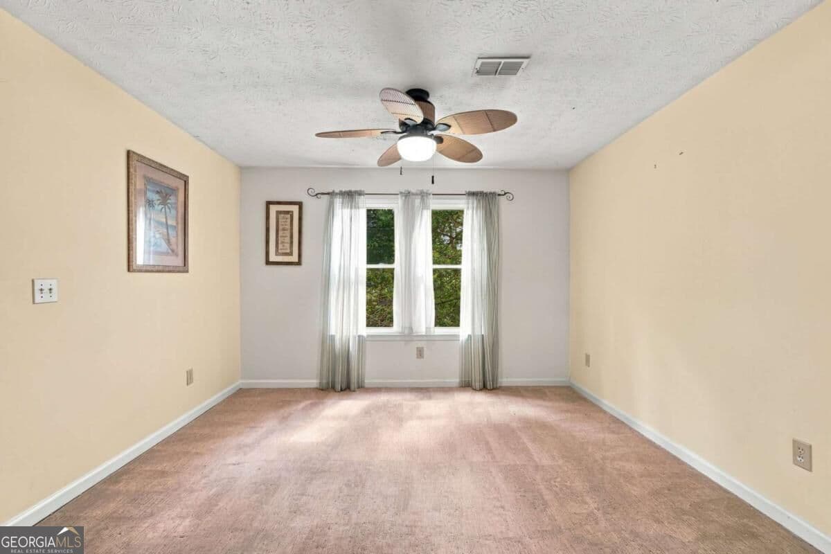 3 bedroom, 2.5 bathroom, 2,185 sq ft single family residence for sale at 5004 Brandlwood Court, Lilburn, GA 30047 — photo 10
