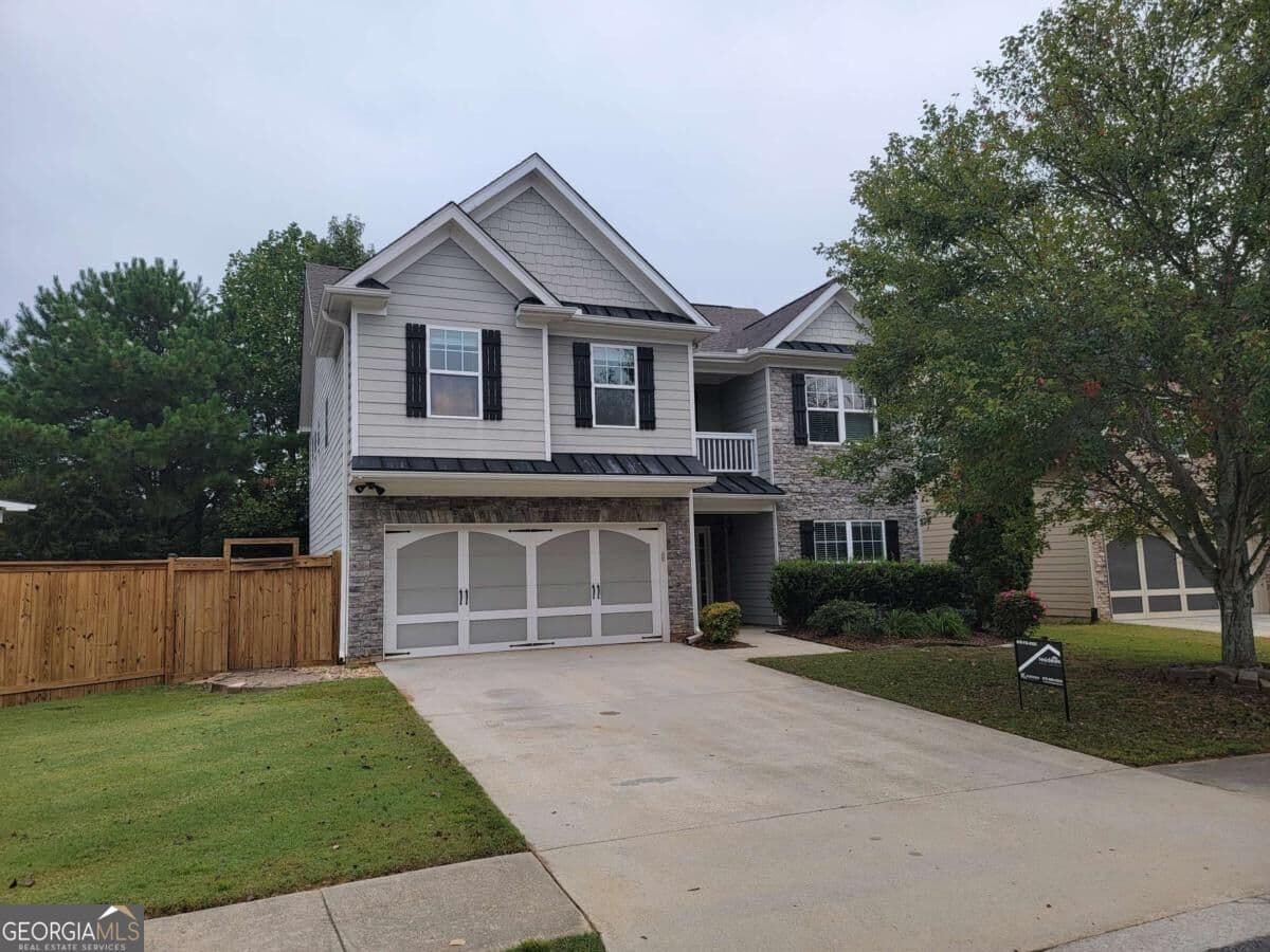 5 bedroom, 2.5 bathroom, 2,708 sq ft single family residence for sale at 908 Upland Ives Drive, Buford, GA 30518 — photo 1 of 36
