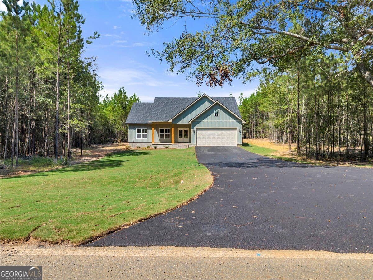 3 bedroom, 2 bathroom, 1,560 sq ft single family residence for sale at 1224 Snow Hill Road, Cadwell, GA 31009 — photo 2