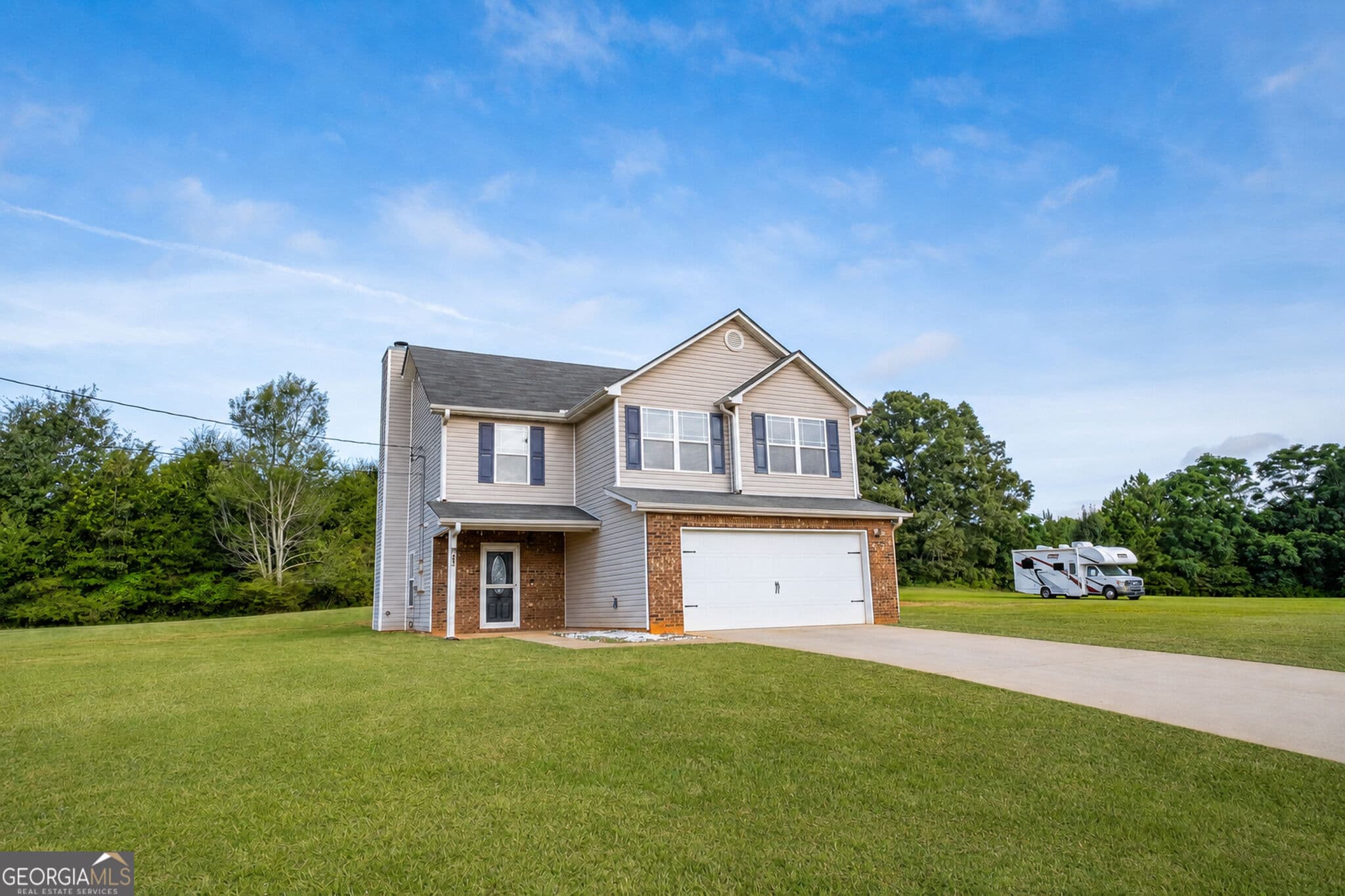 4 bedroom, 2.5 bathroom, 1,836 sq ft single family residence for sale at 315 Furrow Creek Court, Jackson, GA 30233 — photo 2