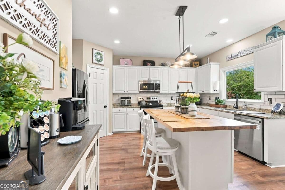 5 bedroom, 2.5 bathroom, 3,152 sq ft single family residence for sale at 475 Leggett Drive, Lawrenceville, GA 30043 — photo 10