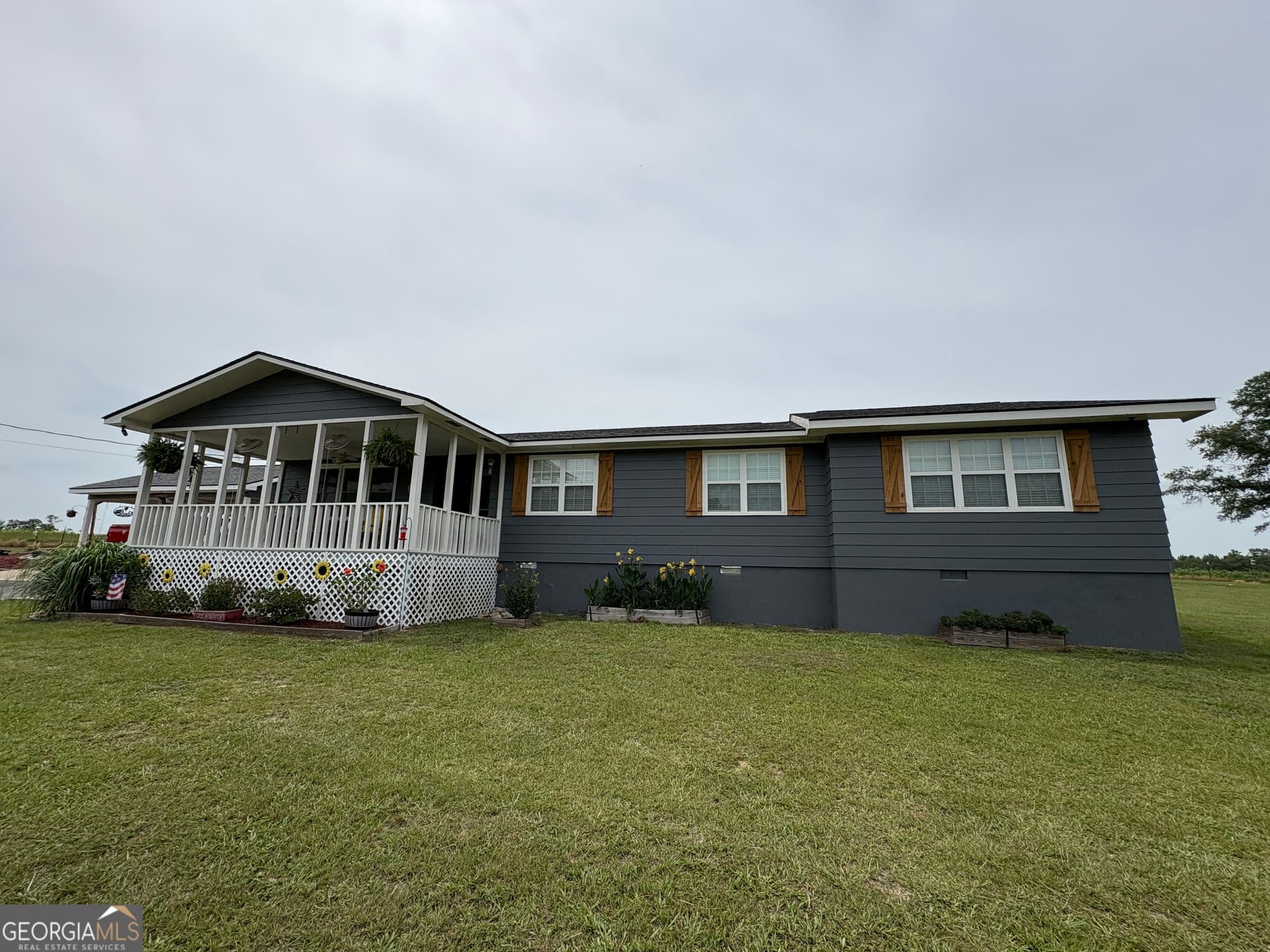 4 bedroom, 2 bathroom, 2,045 sq ft single family residence for sale at 571 Ben Giddens Road, Eastman, GA 31023 — photo 2