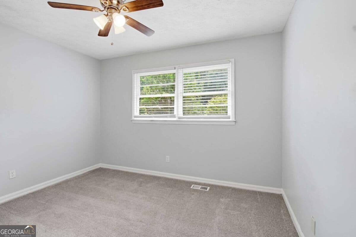3 bedroom, 2 bathroom, 1,384 sq ft single family residence for sale at 7280 Hollyhock Drive, Douglasville, GA 30135 — photo 10
