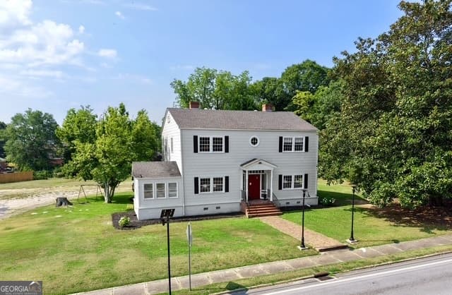 6 bedroom, 2 bathroom, 4,018 sq ft single family residence for sale at 18046 Main Street, Woodbury, GA 30293 — photo 2