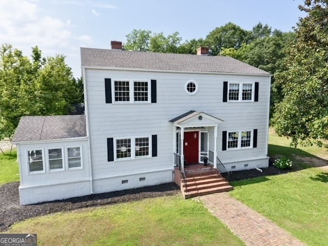 6 bedroom, 2 bathroom, 4,018 sq ft single family residence for sale at 18046 Main Street, Woodbury, GA 30293 — photo 1 of 23
