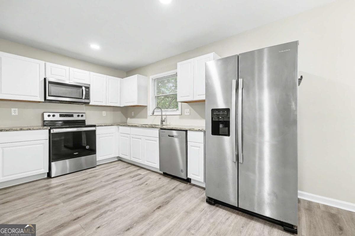 3 bedroom, 2 bathroom, 1,032 sq ft single family residence for sale at 2823 Marco Drive, Atlanta, GA 30318 — photo 8