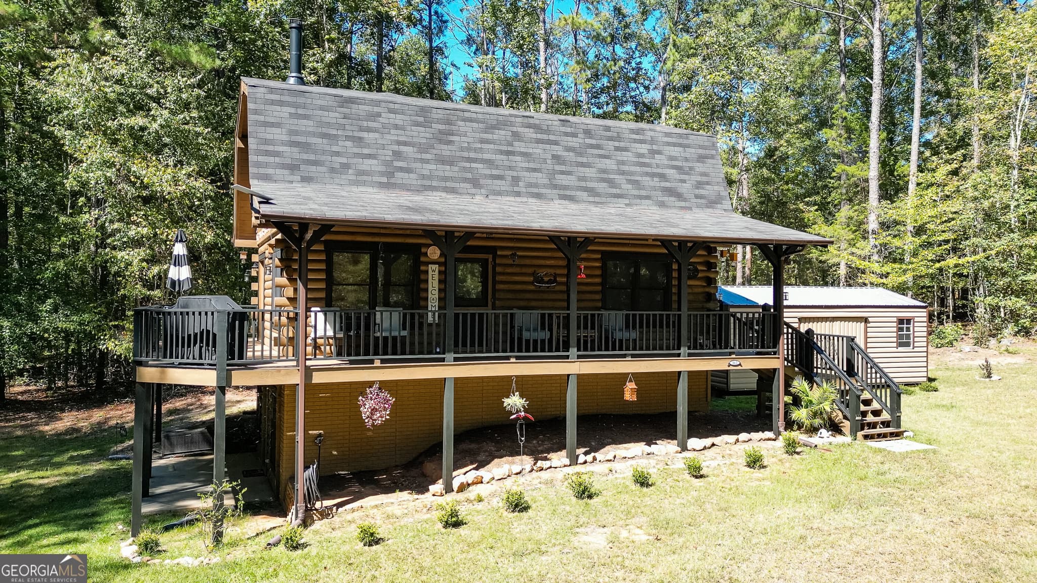 2 bedroom, 2 bathroom, 1,896 sq ft cabin,single family residence for sale at 162 Thompson Road, Senoia, GA 30276 — photo 1 of 34