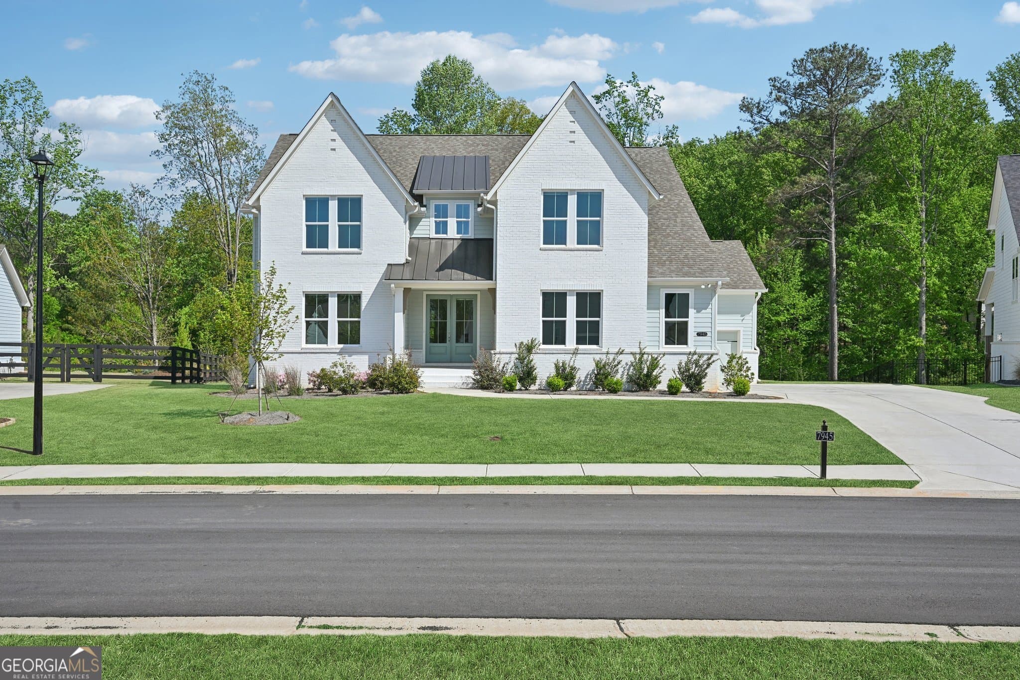 7 bedroom, 4.5 bathroom, 4,030 sq ft single family residence for sale at 7945 Heritage Farm Court, Dawsonville, GA 30534 — photo 1 of 31
