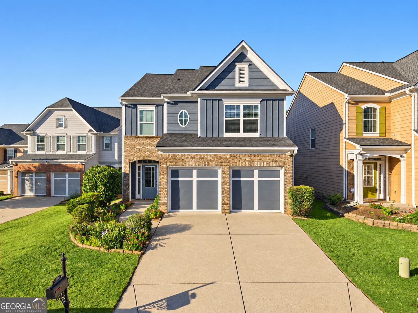 4 bedroom, 3 bathroom, 2,612 sq ft single family residence for sale at 5920 Asby Way, Cumming, GA 30040 — photo 2