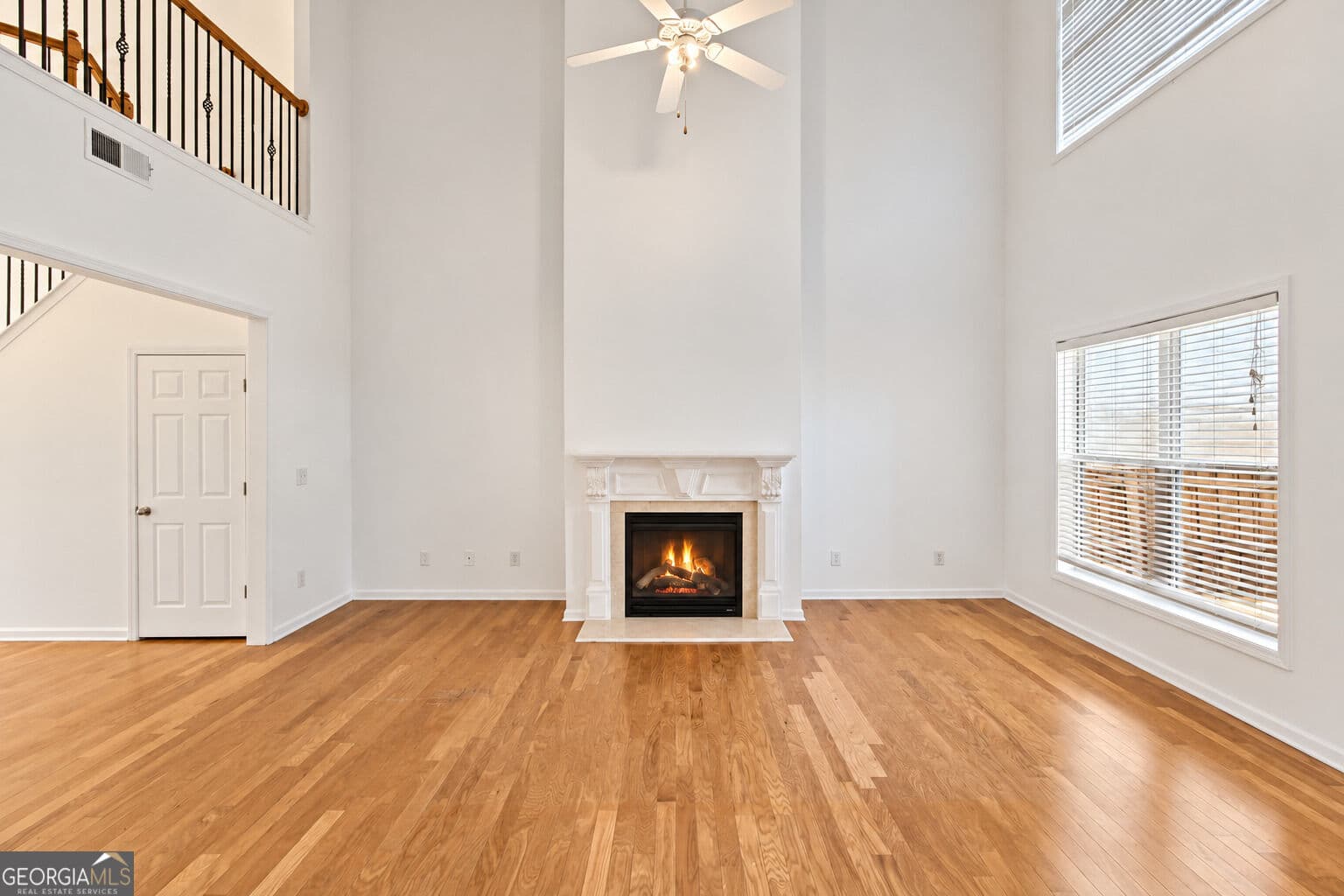 4 bedroom, 3 bathroom, 2,612 sq ft single family residence for sale at 5920 Asby Way, Cumming, GA 30040 — photo 6