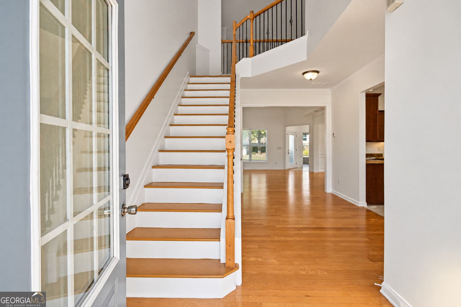 4 bedroom, 3 bathroom, 2,612 sq ft single family residence for sale at 5920 Asby Way, Cumming, GA 30040 — photo 3