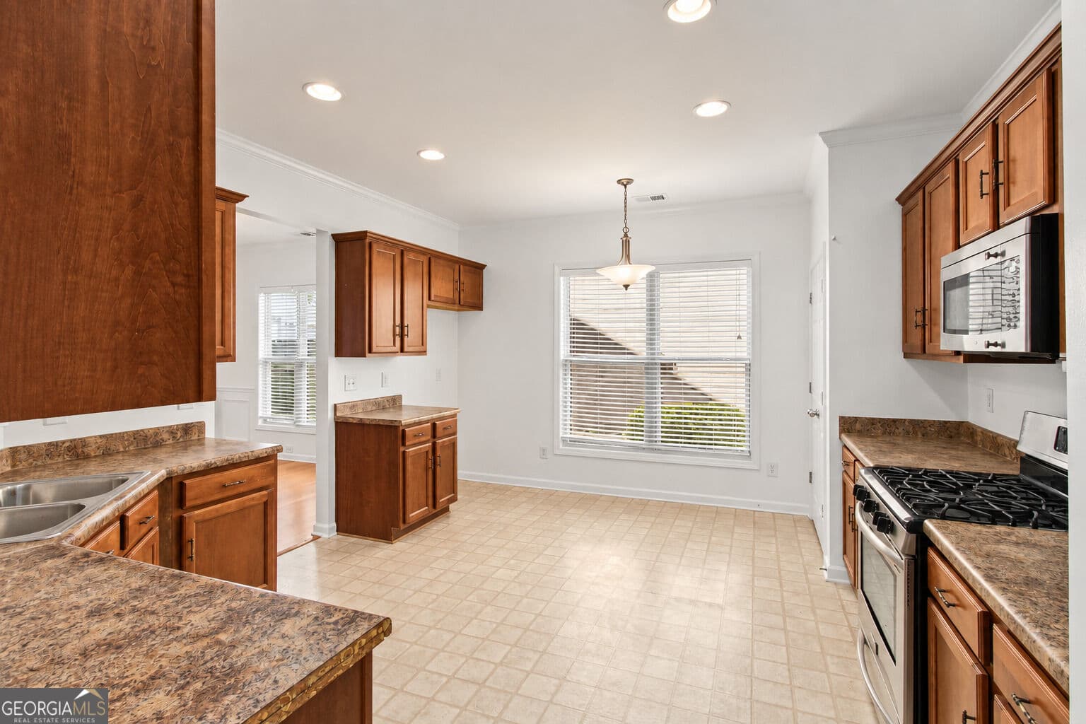 4 bedroom, 3 bathroom, 2,612 sq ft single family residence for sale at 5920 Asby Way, Cumming, GA 30040 — photo 9