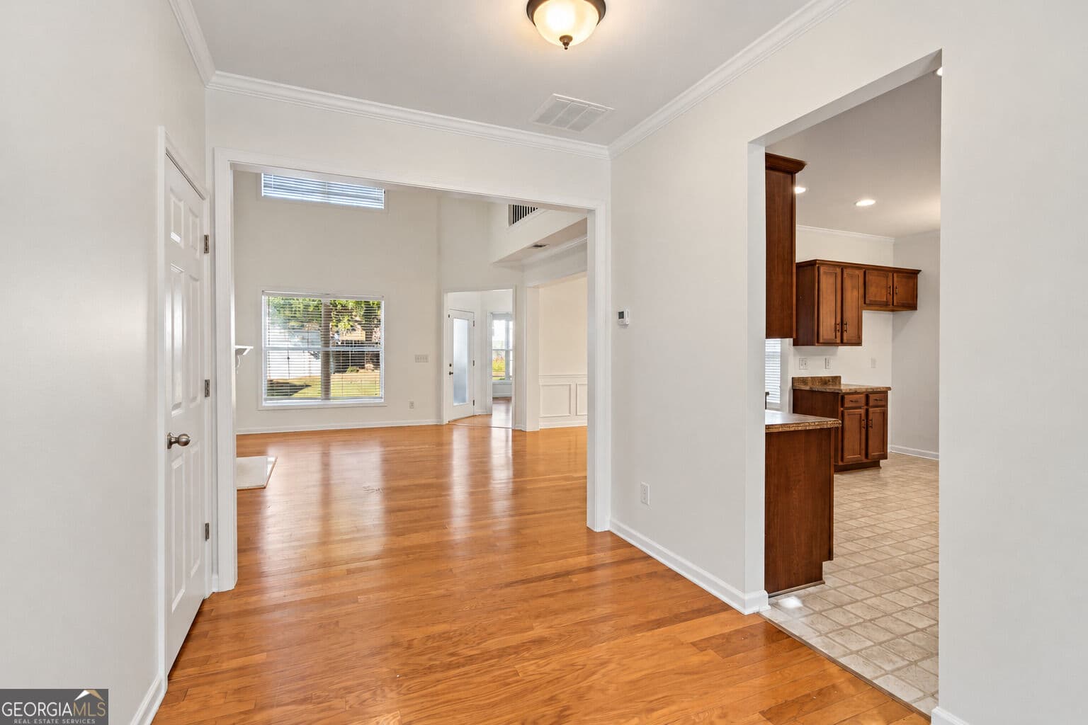 4 bedroom, 3 bathroom, 2,612 sq ft single family residence for sale at 5920 Asby Way, Cumming, GA 30040 — photo 4