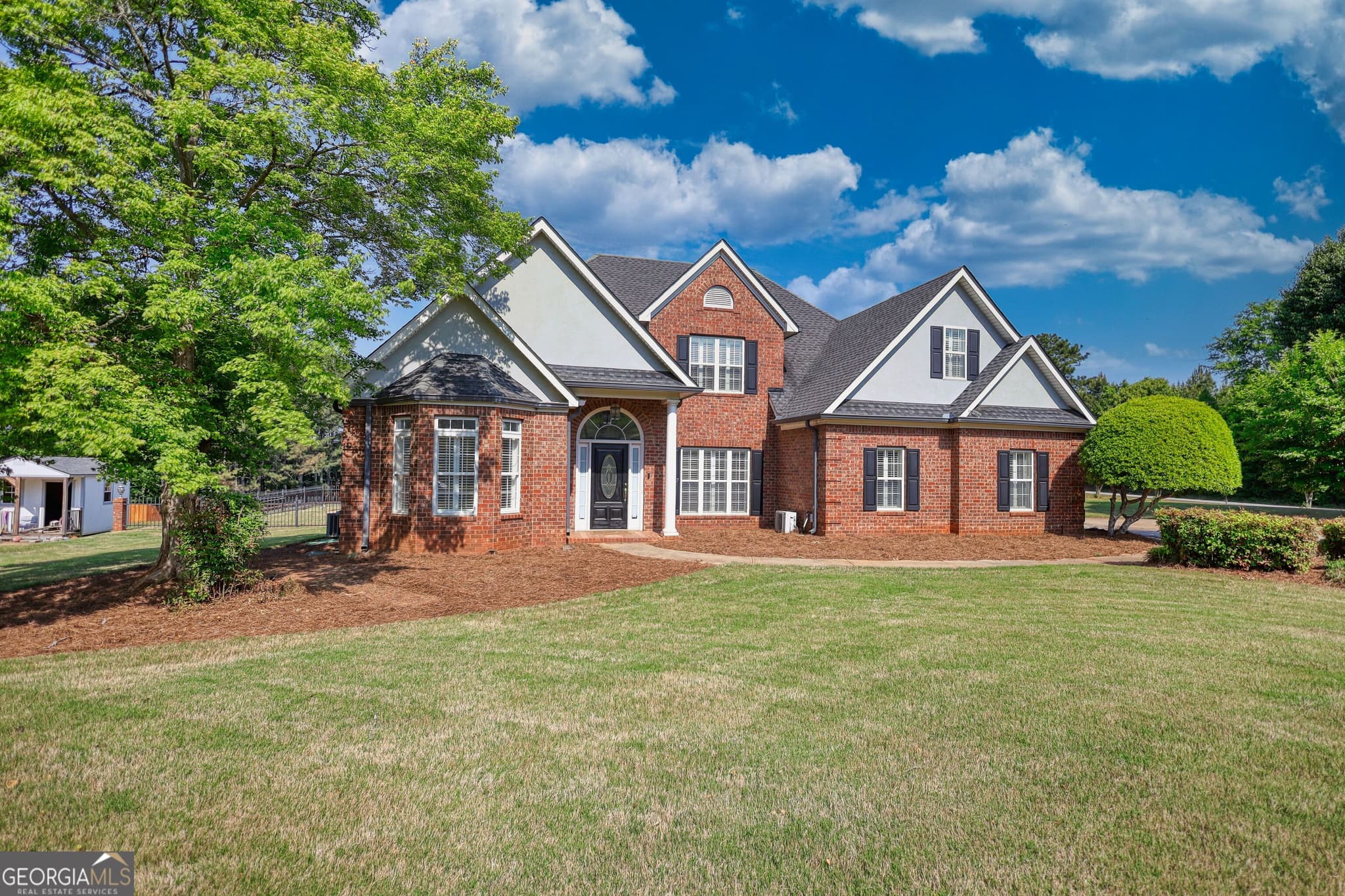 5 bedroom, 3 bathroom, 3,600 sq ft single family residence for sale at 100 Westminster Way, Mcdonough, GA 30252 — photo 2