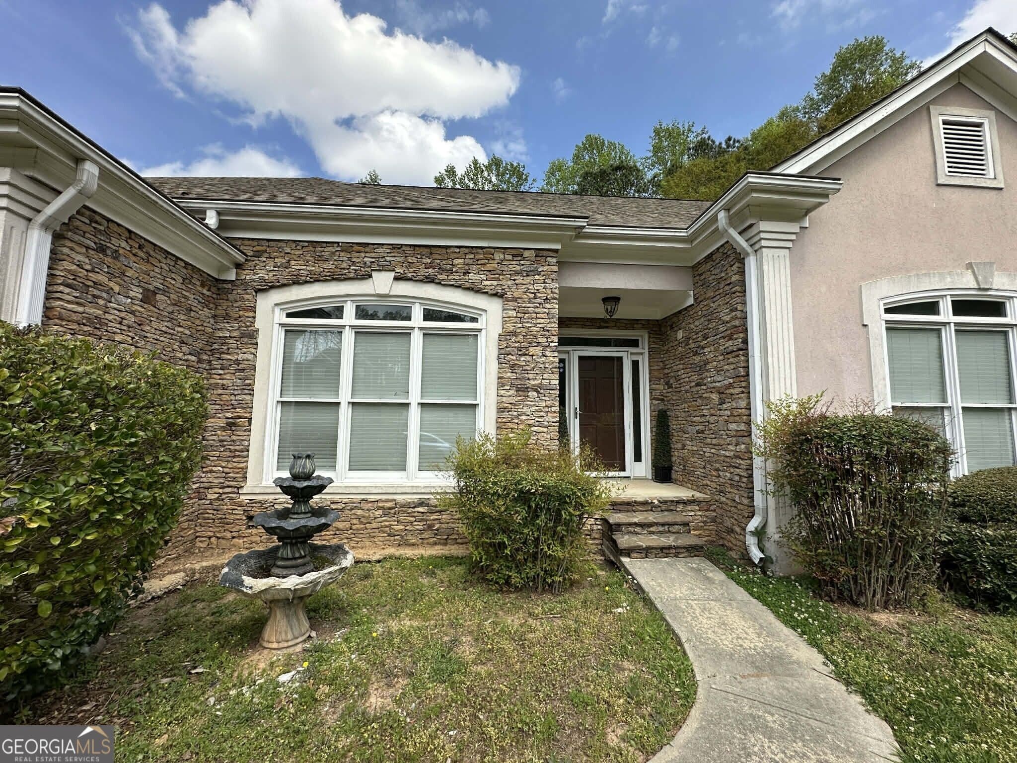5 bedroom, 4 bathroom, 4,620 sq ft single family residence for sale at 4065 Pate Branch Court, Loganville, GA 30052 — photo 3