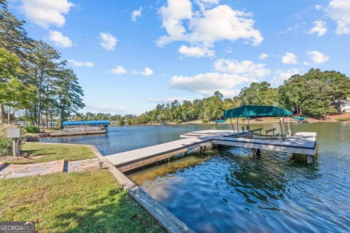 3 bedroom, 3.5 bathroom, 3,556 sq ft single family residence for sale at 2731 Club Drive, Greensboro, GA 30642 — photo 4