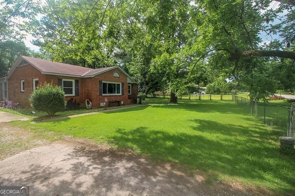 3 bedroom, 1 bathroom, 1,476 sq ft single family residence for sale at 7840 Fortson Road, Columbus, GA 31909 — photo 2