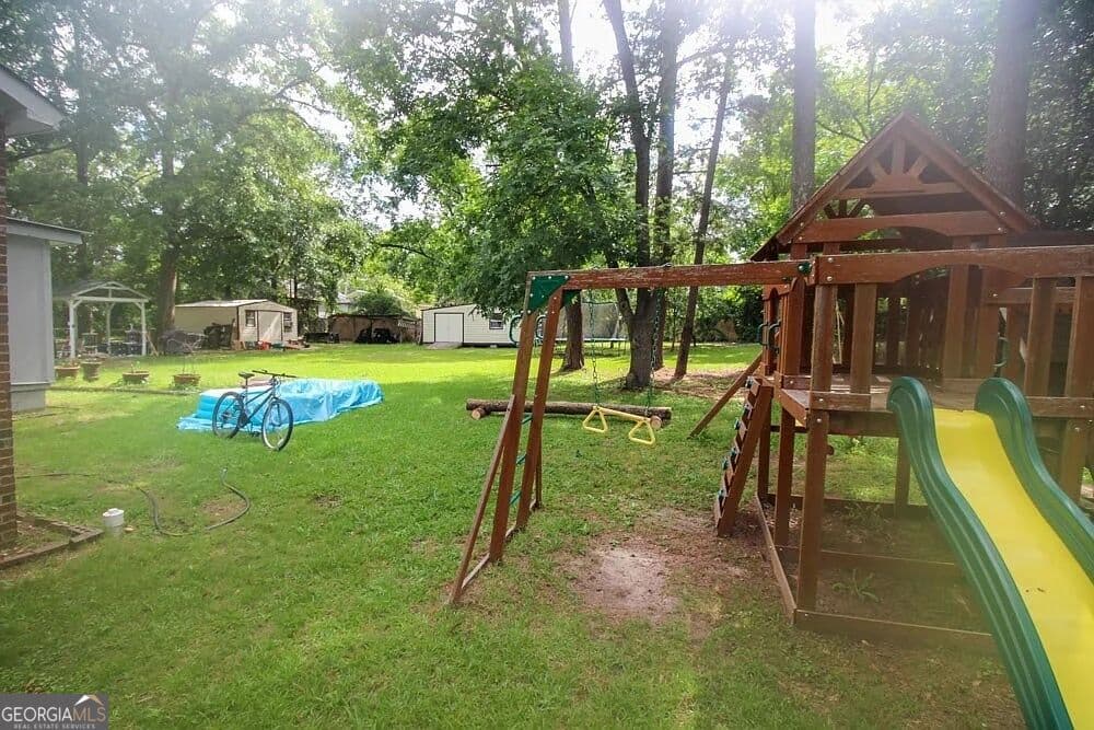 3 bedroom, 1 bathroom, 1,476 sq ft single family residence for sale at 7840 Fortson Road, Columbus, GA 31909 — photo 4