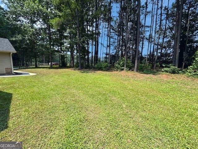 4 bedroom, 2 bathroom, 1,800 sq ft single family residence for sale at 6648 Luthersville Road, Gay, GA 30218 — photo 6