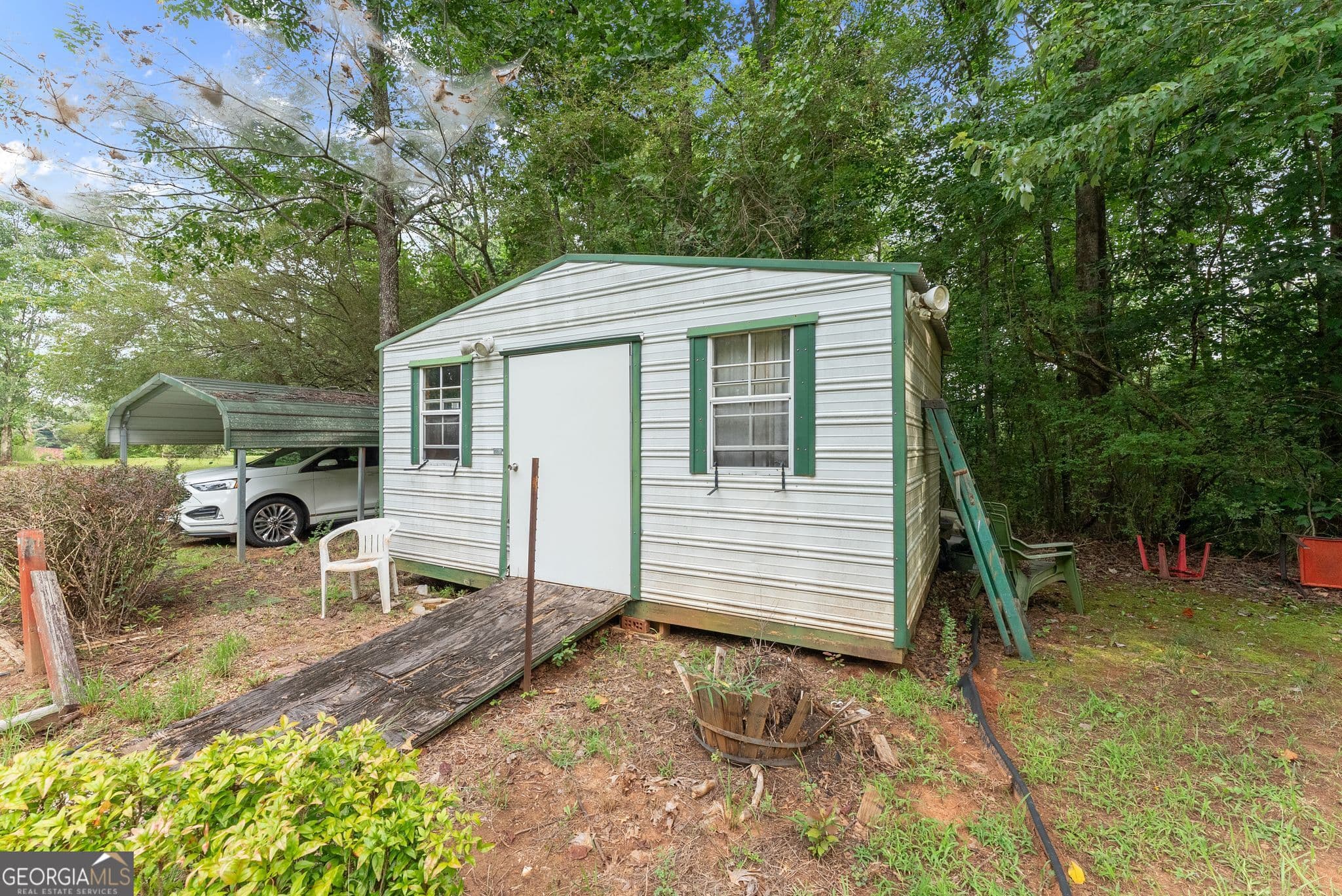 4 bedroom, 3 bathroom, 3,574 sq ft single family residence for sale at 6140 Henry Smith Road, Murrayville, GA 30564 — photo 2