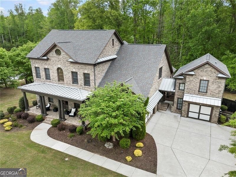 6 bedroom, 5.5 bathroom, 6,936 sq ft single family residence sold at 4060 Orchard Way, Alpharetta, GA 30004
