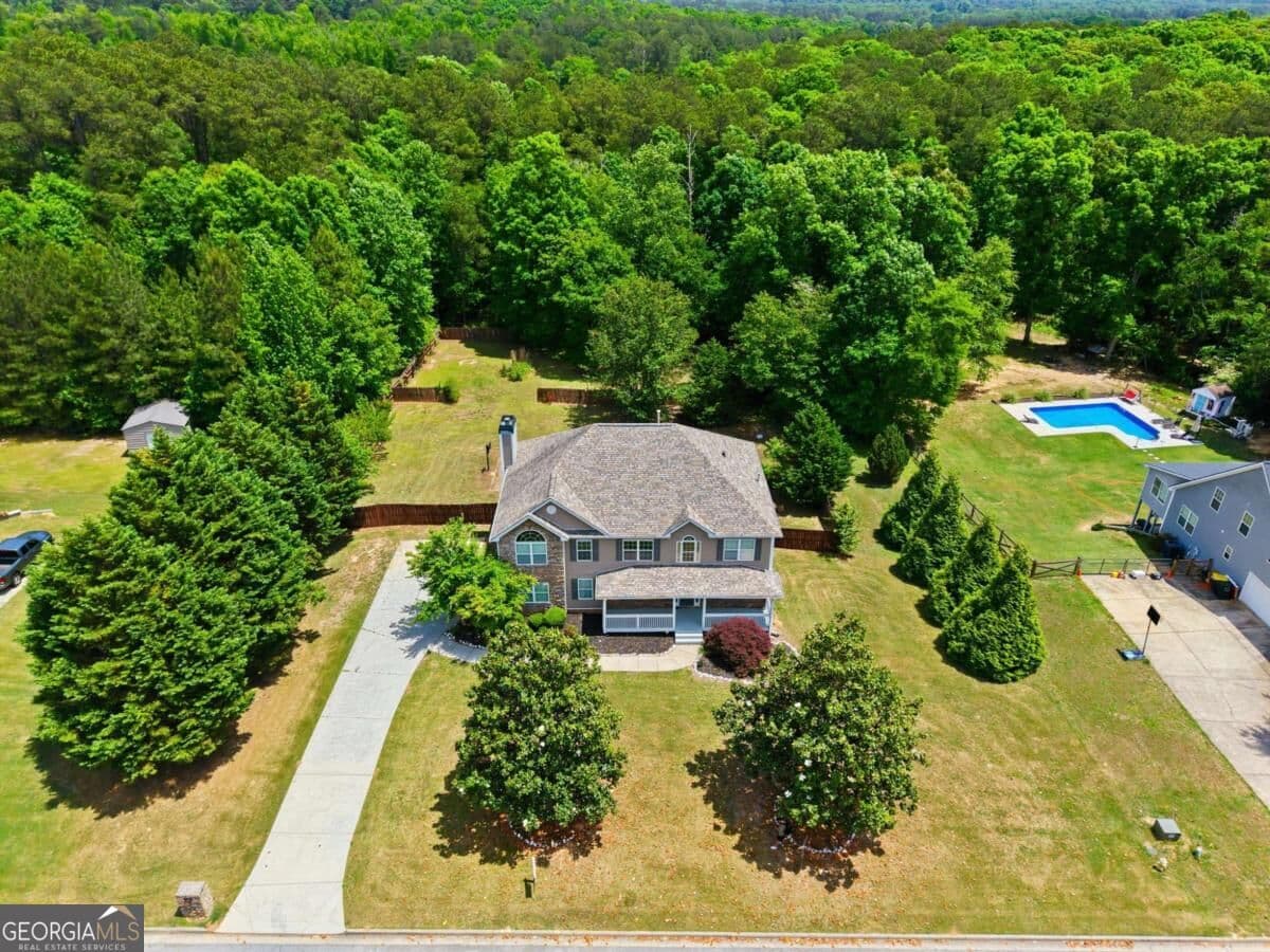 5 bedroom, 4.5 bathroom, 4,768 sq ft single family residence for sale at 65 Ashford Drive, Oxford, GA 30054 — photo 2