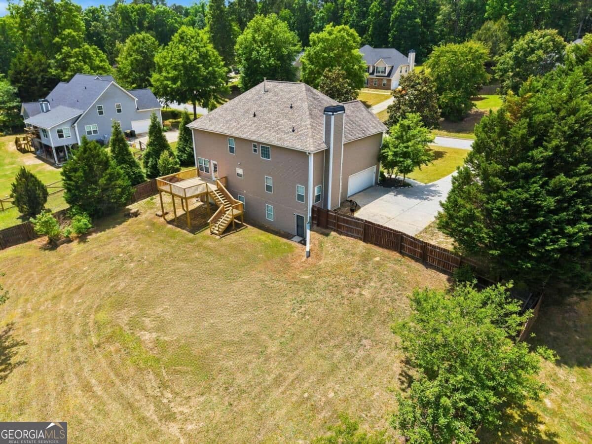 5 bedroom, 4.5 bathroom, 4,768 sq ft single family residence for sale at 65 Ashford Drive, Oxford, GA 30054 — photo 5