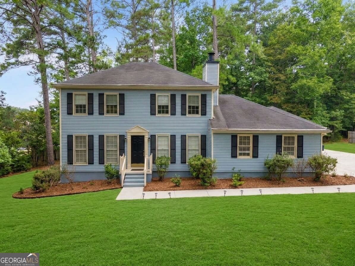 3 bedroom, 2.5 bathroom, 2,340 sq ft single family residence for sale at 145 S Mourning Dove Drive, Fayetteville, GA 30215 — photo 1 of 38