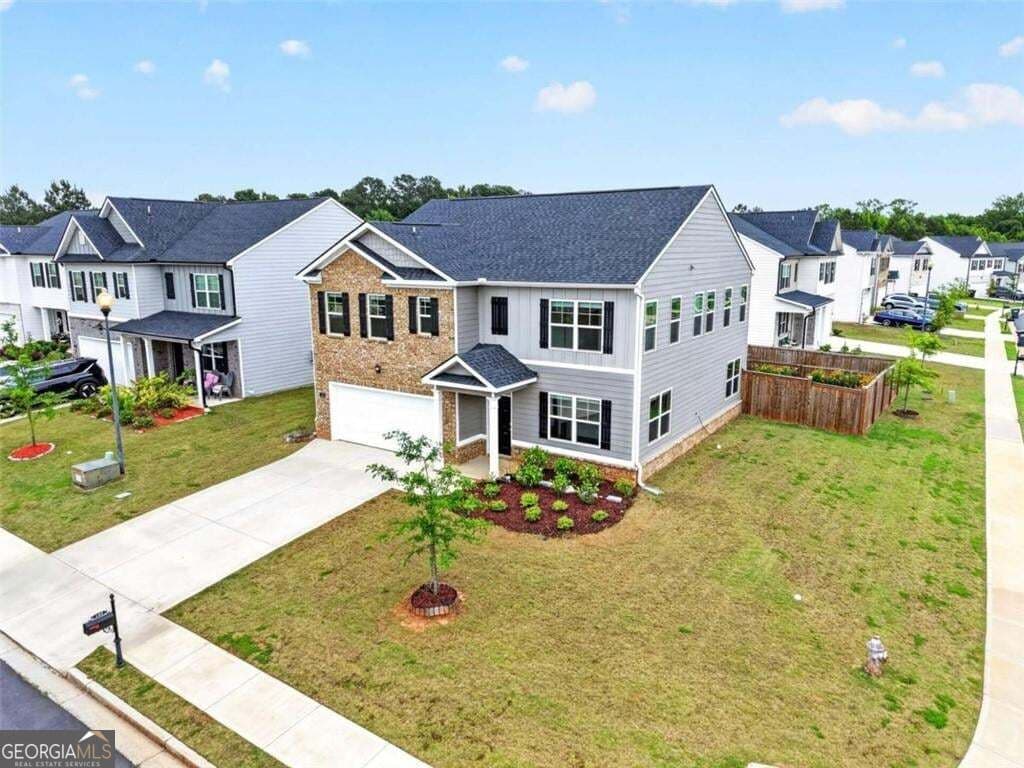 5 bedroom, 3 bathroom, 2,511 sq ft single family residence for sale at 155 Amberjack Trail, Covington, GA 30016 — photo 2