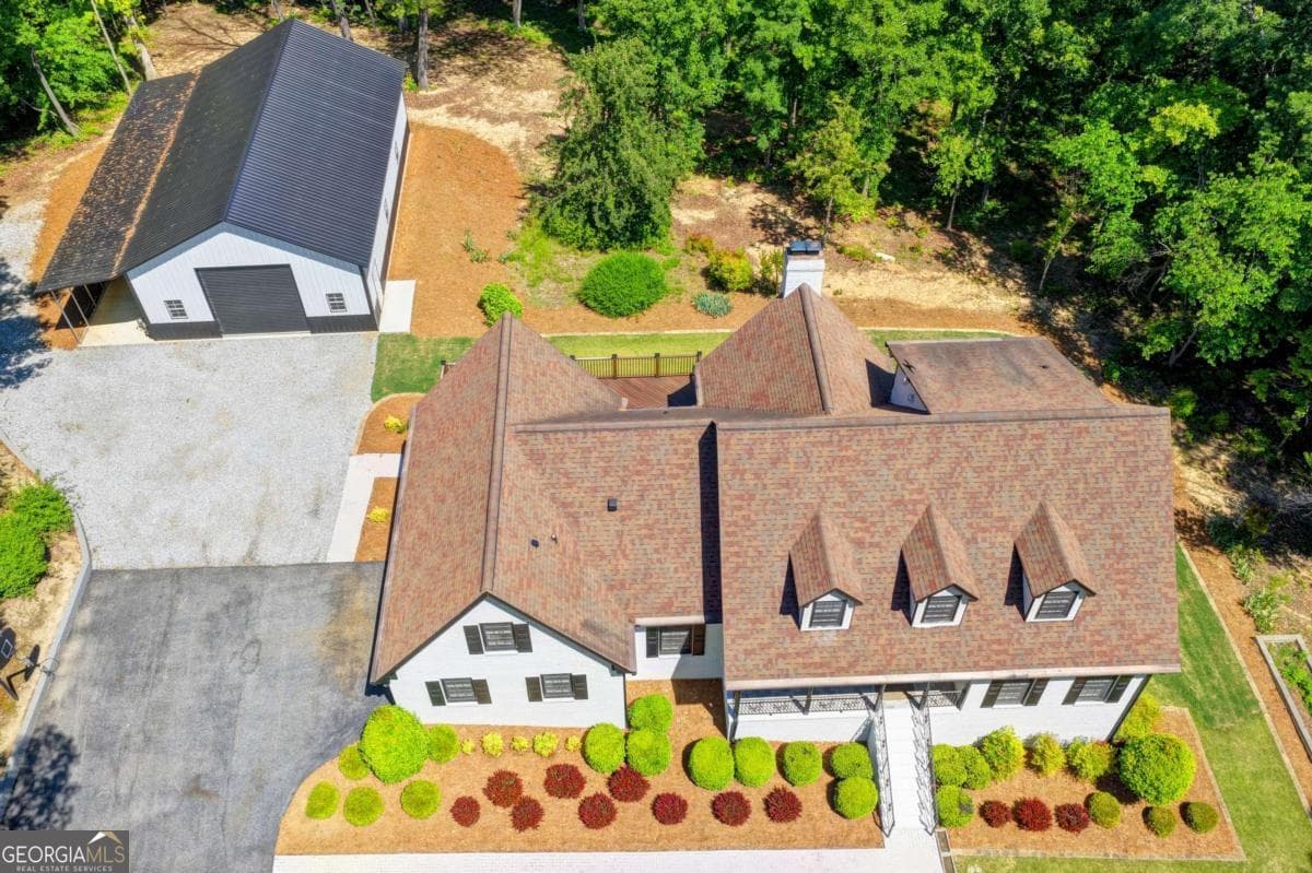 6 bedroom, 5.5 bathroom, 5,398 sq ft single family residence for sale at 1505 Old Fountain Road, Lawrenceville, GA 30043 — photo 4